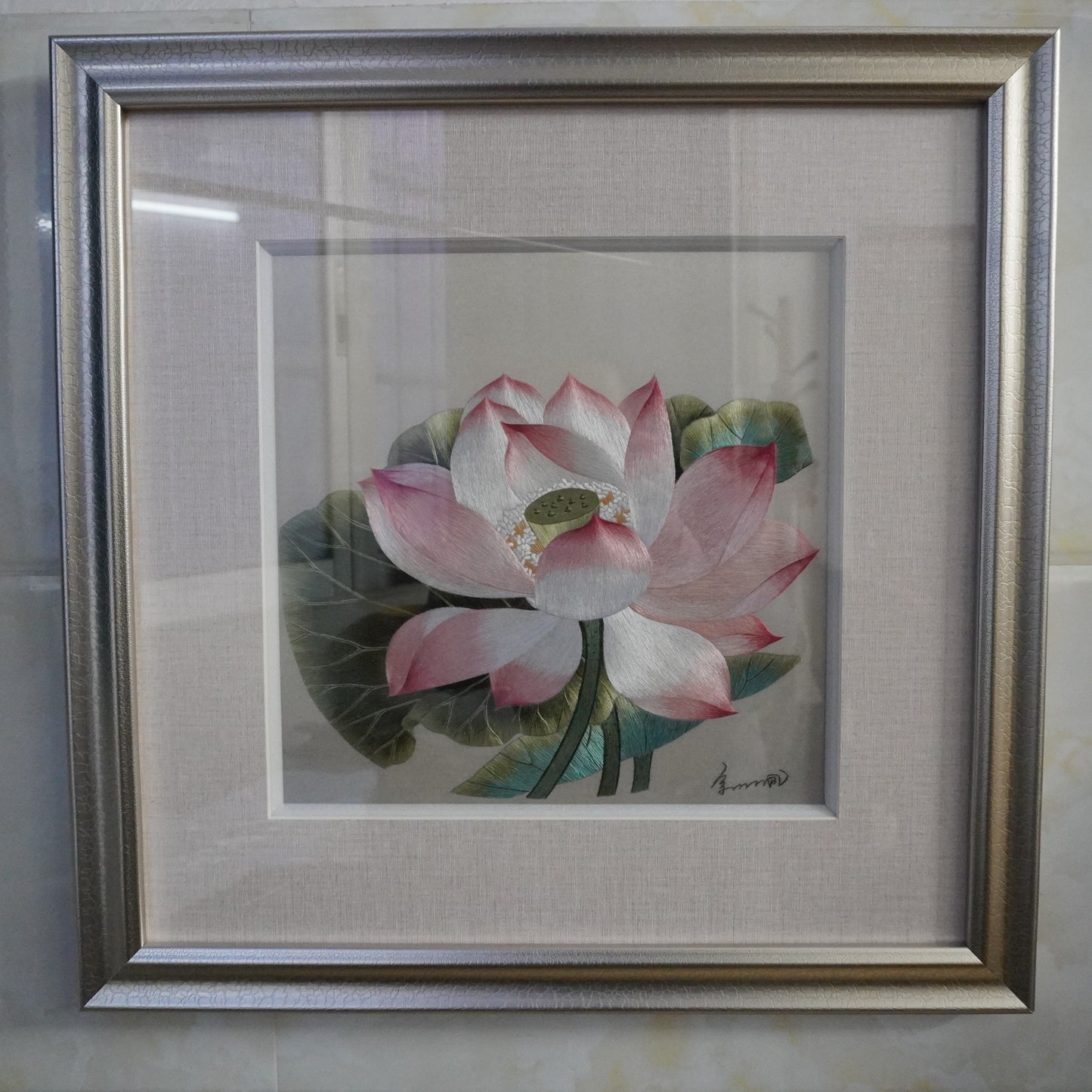 Canton embroidery of Song Dynasty lotus painting. Hand-embroidered silk art in silver frame.