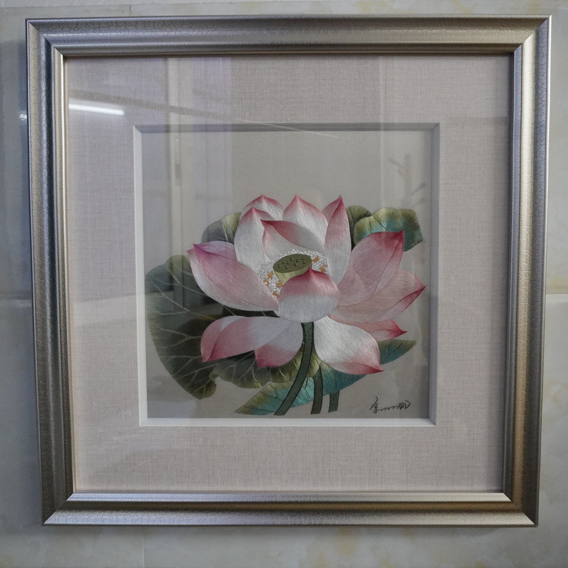 Canton embroidery of Song Dynasty lotus painting. Hand-embroidered silk art in silver frame.