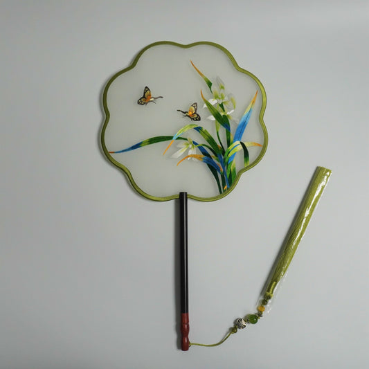 Double-sided embroidery orchid and butterfly on silk gauze fan. Plum blossom shaped frame with redwood handle, jade bead tassel.