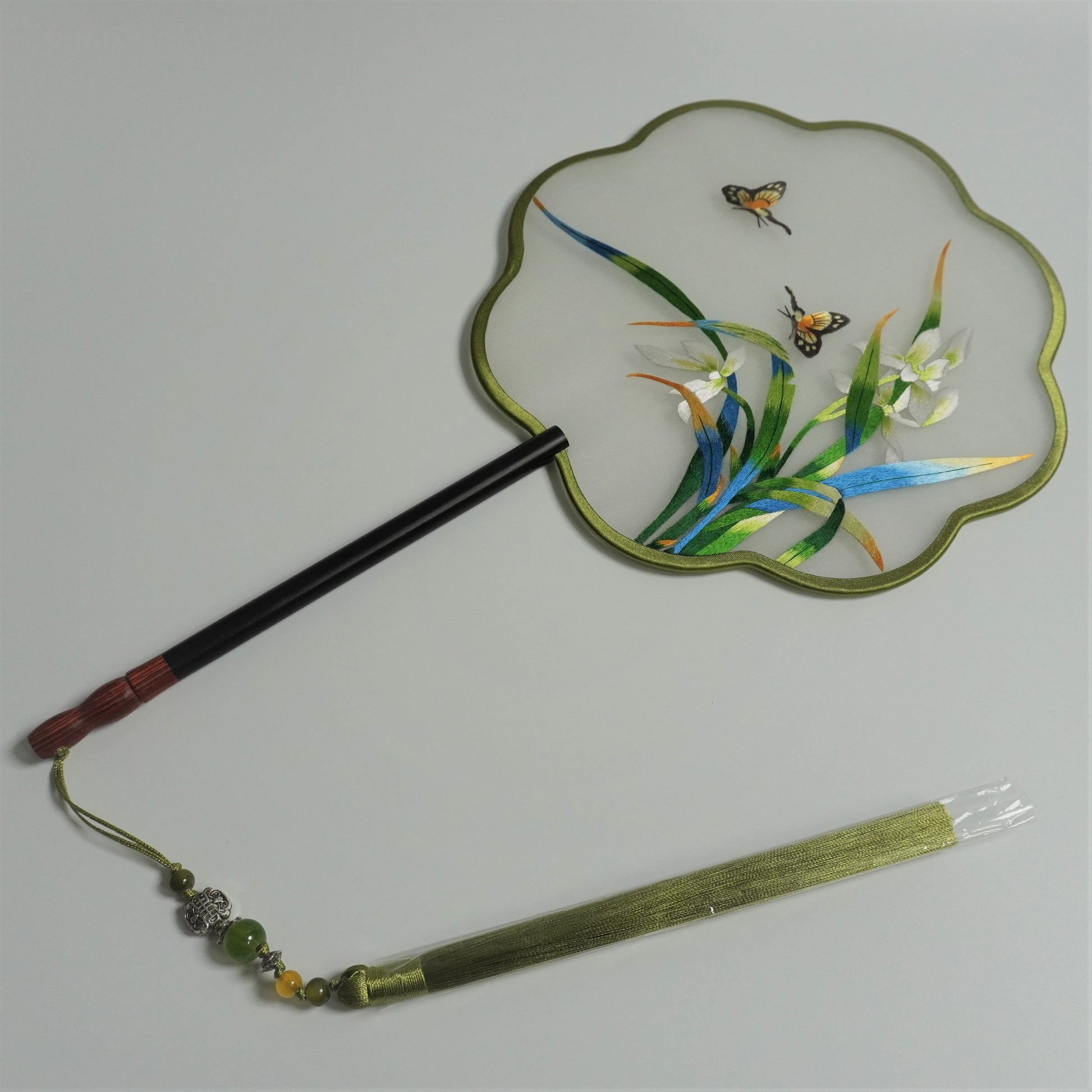 Double-sided embroidery orchid and butterfly green color round fan with redwood handle, jade bead tassel.