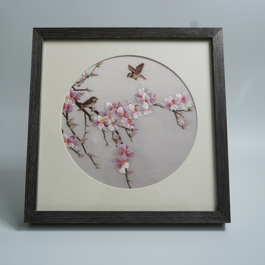 Hand-embroidered magnolia and birds in black wood